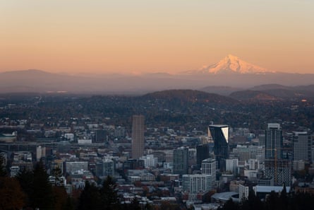 a mountain behind a city