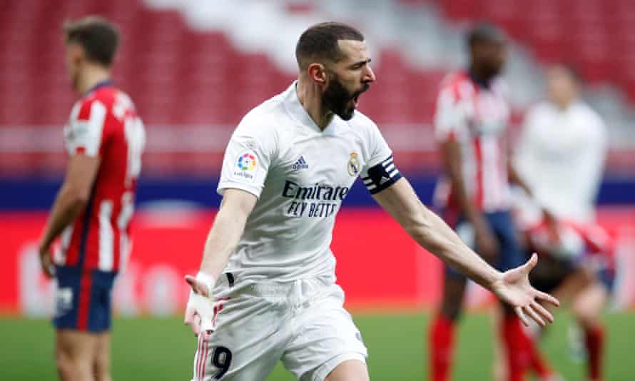 Karim Benzema celebrates his late equaliser at the Wanda Metropolitano.