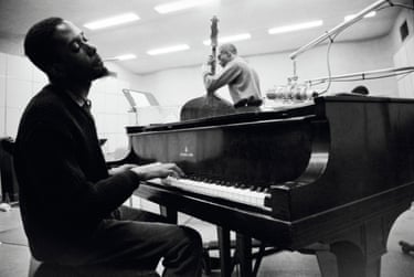 ‘Head cocked, leaning away from the piano with a quietly ecstatic look on his face, that’s Timmons. We don’t know if he is tuning into the bass player in the background (Sam Jones) or just fooling around at the keyboard during a break, stumbling on chords that speak to him, that transport him. Whatever it is, Schapiro has captured this moment in the interior life of an artist’