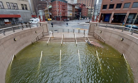 A view of a flooded lower Manhattan plaza after Hurricane Sandy left most of the area without power in 2012, New York City, USA.