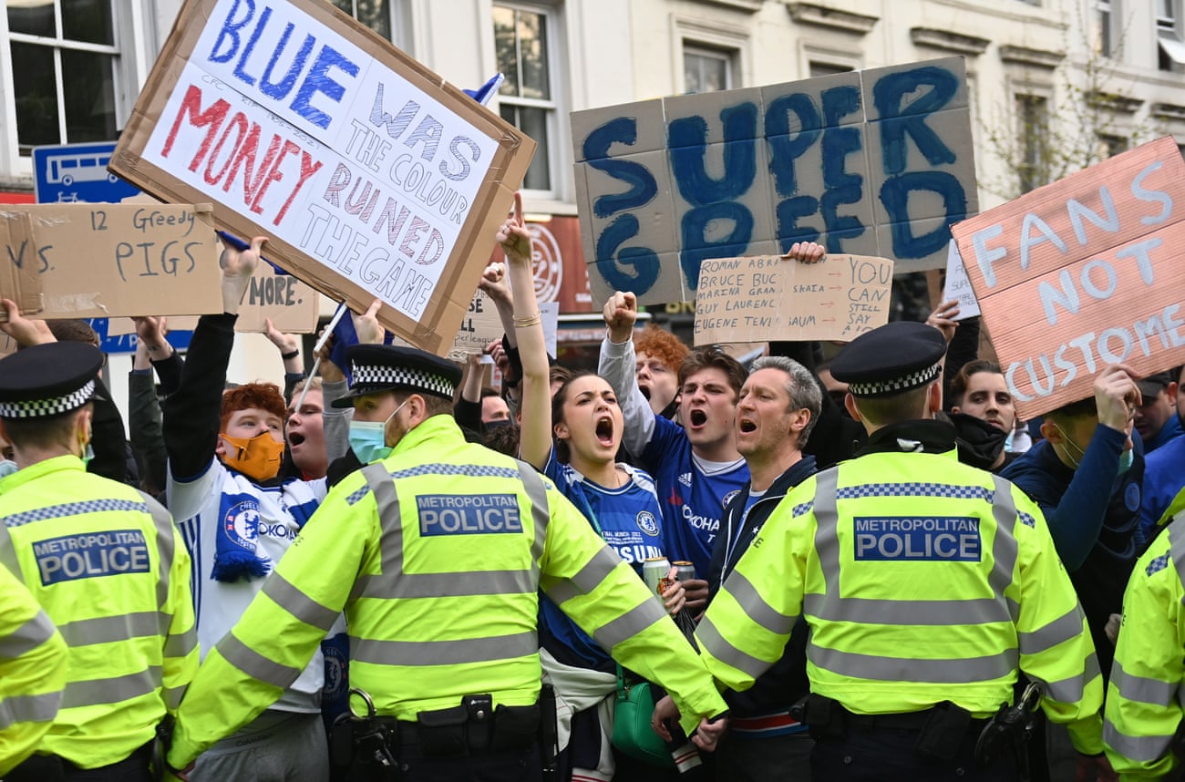 Chelsea fans stage a demonstration against the proposed European Super league before their match with Brighton.