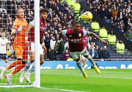 Ashley Young clears the ball off the line as Villa escape.