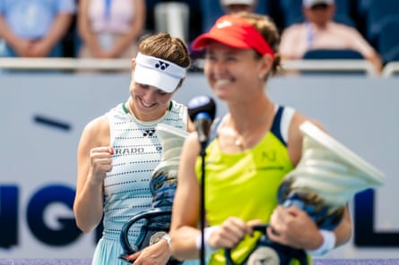 Linda Noskova clenches a fist in celebration as Marie Bouzkova is interviewed after their doubles win in Cincinatti