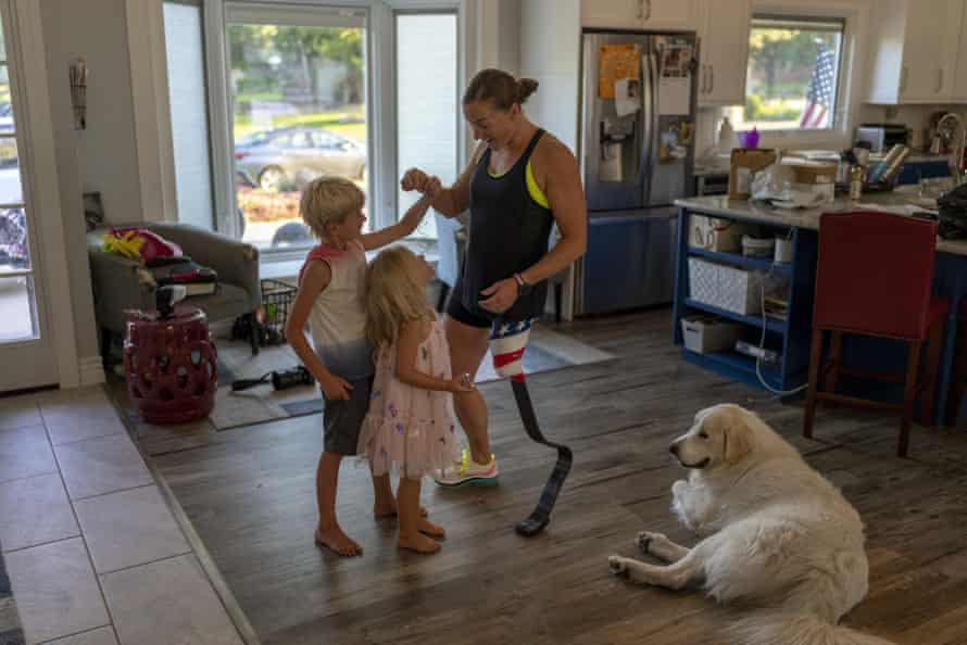 Melissa Stockwell plays with her children, Dallas and Millie, in their home in Colorado Springs, ahead of the Olympics. “I’ve always been an optimistic person,” she says. “Probably annoyingly optimistic to lots of people.”