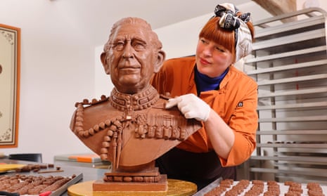 sculptor with edible chocolate bust of King Charles III