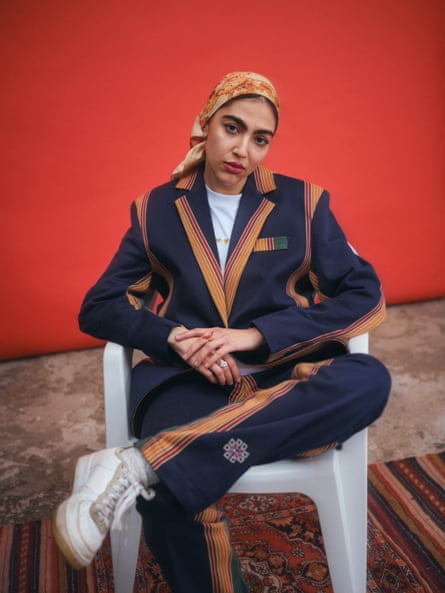 A striped suit look from Nöl Collective’s autumn/winter 2023 collection.