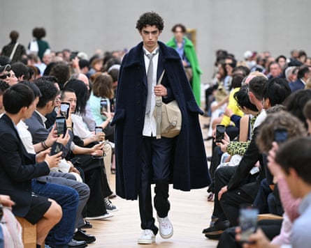 A model presents a creation by Dior Homme for the menswear Ready-to-wear Spring-Summer 2026 collection as part of the Paris fashion week in Paris, on 27 June 2025.