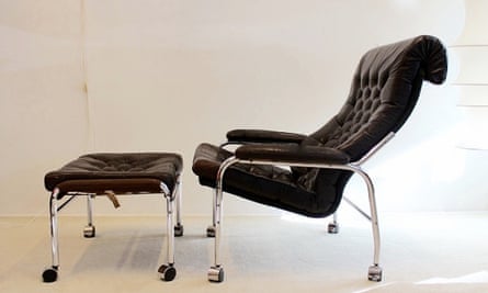 Bore leather lounge chair with footstool.