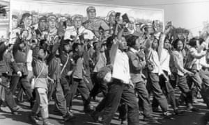 Students wave copies of Mao Zedongâs Little Red Book at the start of the Cultural Revolution, Beijing, 1966