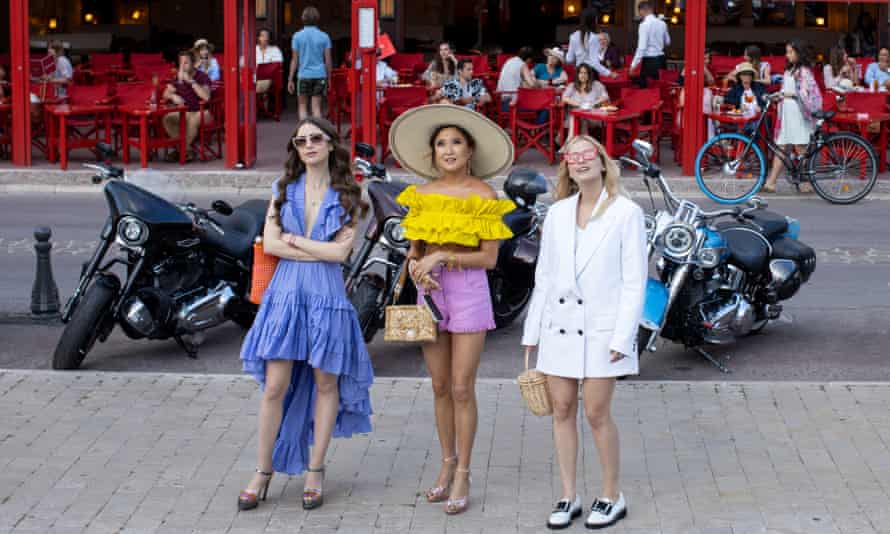 From left: Lily Collins, Ashley Park and Camille Razat in Emily in Paris.