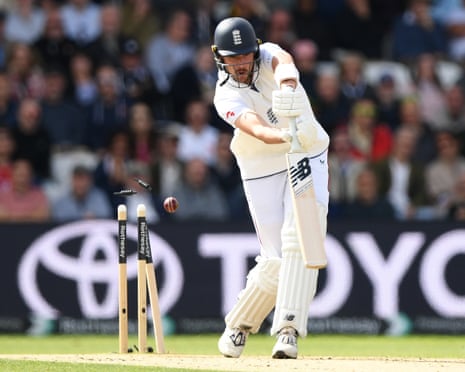 Josh Tongue of England is bowled out on day three.