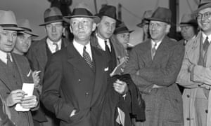 Justice Hugo Black surrounded by press in Norfolk, Virginia.