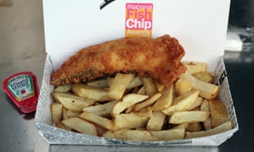 Fish and chips takeaway in a box.