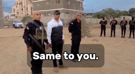Yasser Abu Shabab and his deputy, Ghassan al-Duhaini, stand with armed men in Rafah