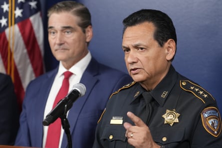 Harris County Sheriff Ed Gonzalez speaks at a microphone beside District Attorney Sean Teare