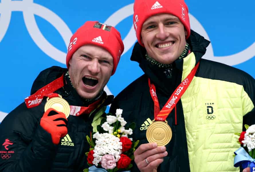Francesco Friedrich and Thorsten Margis of Germany celebrate.