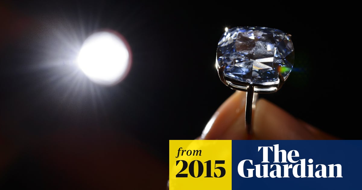 Flawless 12 Carat Blue Moon Diamond Sells For World Record 48 4m In Geneva World News The Guardian