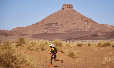 A competitor traversing the Moroccan Sahara desert during the 257km Marathon des Sables.