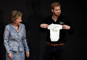 Prince Harry receives a onesie for baby Archie from Princess Margriet