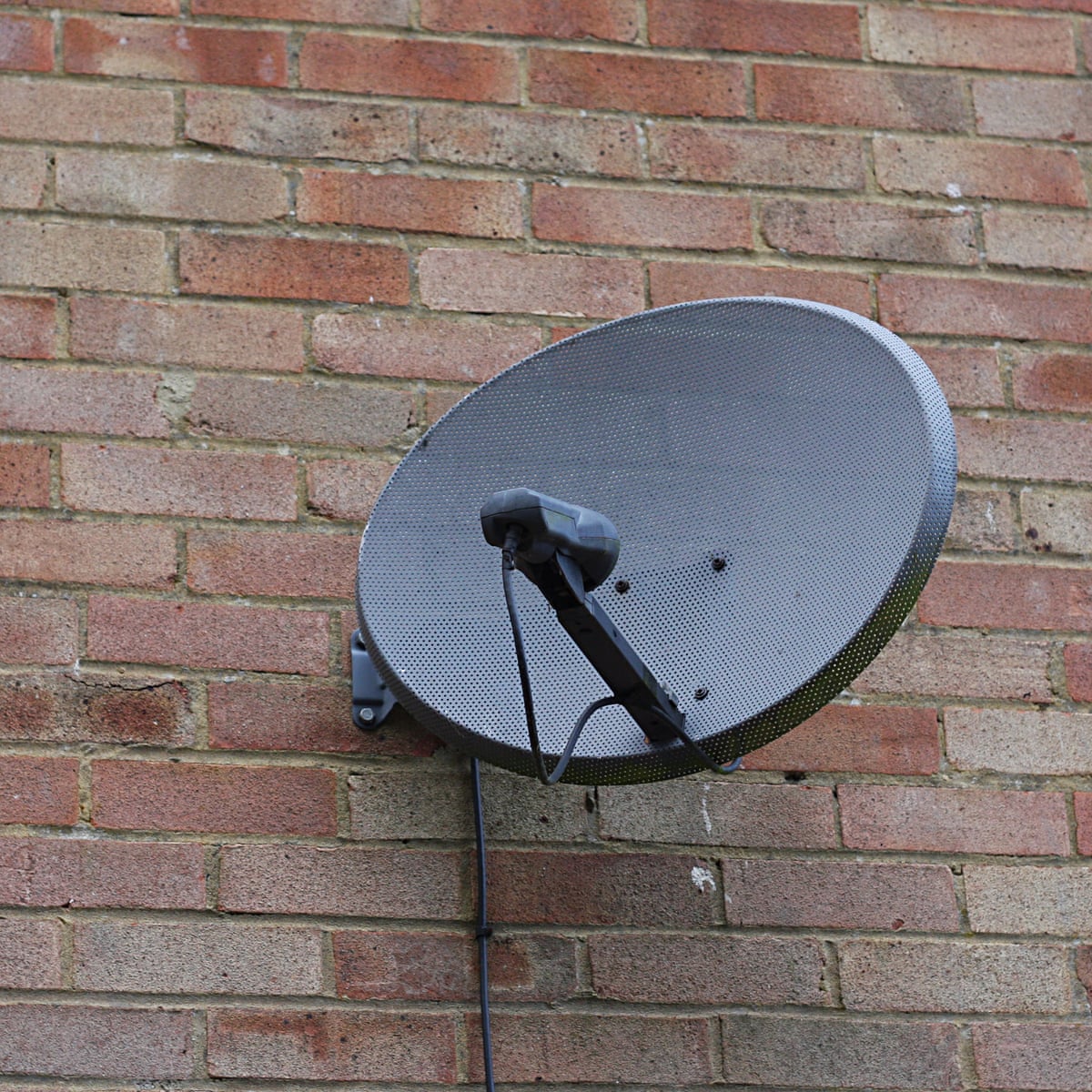 Why do satellite dishes have two cables?