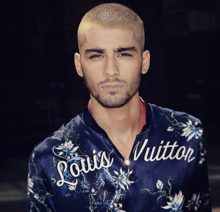 Zayn Malik wears silk shirt to Louis Vuitton show in Paris