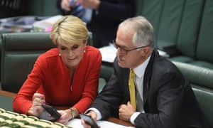 Australian prime minister Malcolm Turnbull and foreign minister Julie Bishop scan their phones during question time on Wednesday.