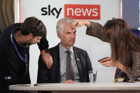 James Cartlidge being prepared for a Sky News interview.