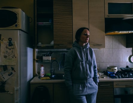 Naboka standing in her kitchen