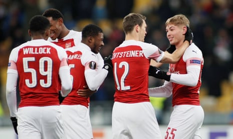 Arsenal’s Emile Smith Rowe celebrates with Stephan Lichtsteiner and teammates before his goal was chalked off for offside.