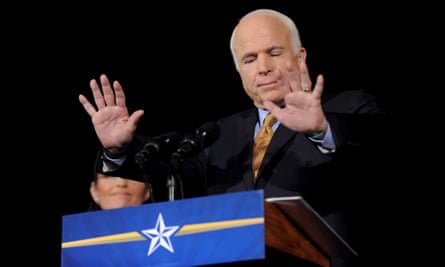 McCain quiets his supporters while giving his concession speech in Phoenix, Arizona.