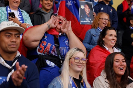 Samoan fans cheer on their team against England.