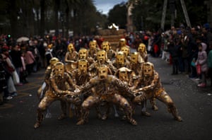 People perform during the traditional Epiphany parade in Malaga