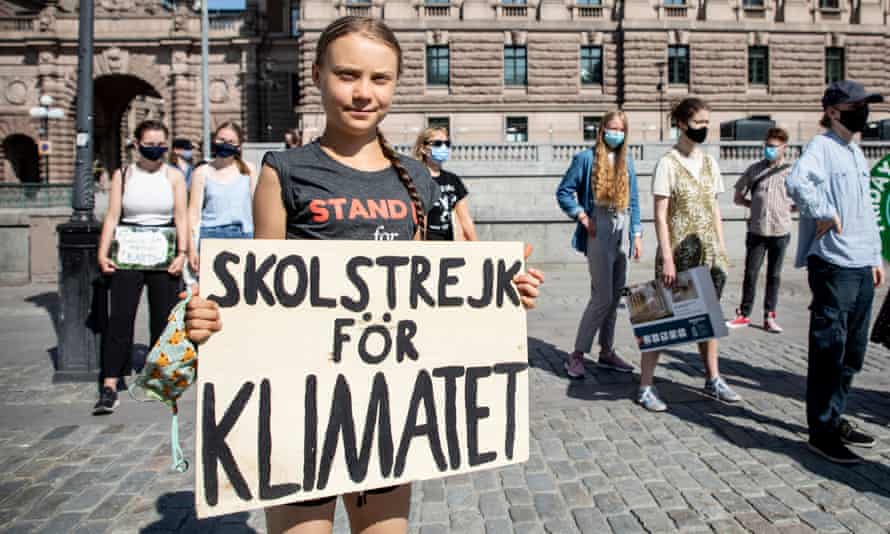 Greta Thunberg and other protesters during their School Strike for Climate in front of the Swedish parliament building.