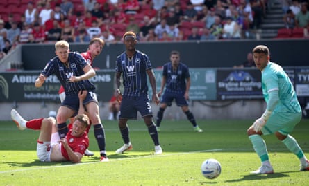 Josh Coburn scores Millwall’s second against Bristol City.