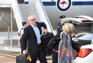 Malcolm Turnbull and wife Lucy (right) arrive at the Fairbairn RAAF Base in Canberra, before nine days of travel through Asia and Europe.