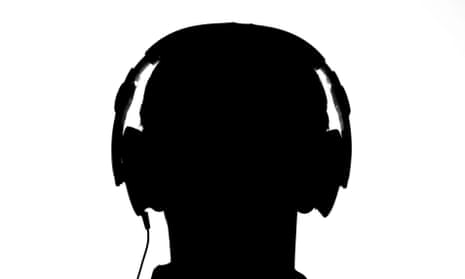 silhouette of man with headphones