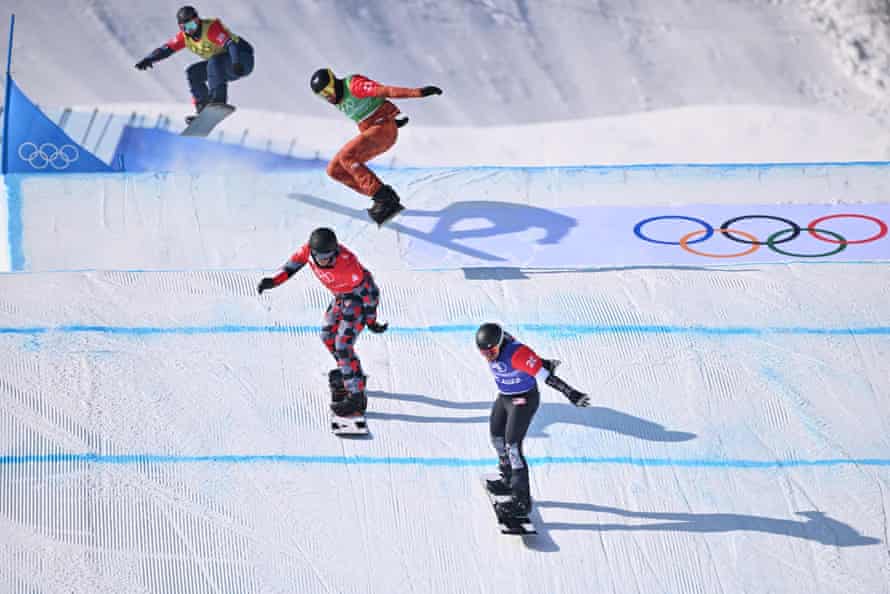 Britain’s Huw Nightingale, Canada’s Liam Moffatt, Austria’s Alessandro Haemmerle and USA’s Mick Dierdorff compete in the snowboard men’s cross