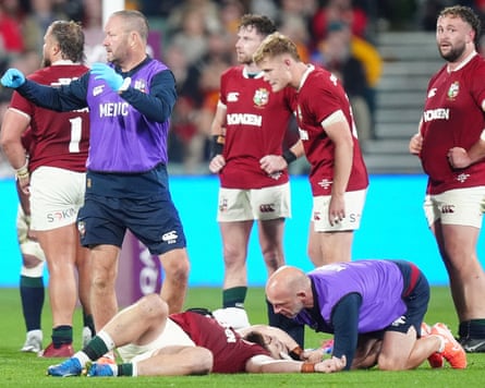 Luke Cowan-Dickie receives medical attention.