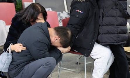 South Korea in mourning after plane crash kills all but two onboard 2 People grieving at the airport