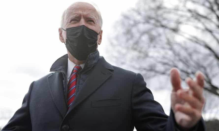 Joe Biden speaks to journalists before boarding Marine One at the White House.