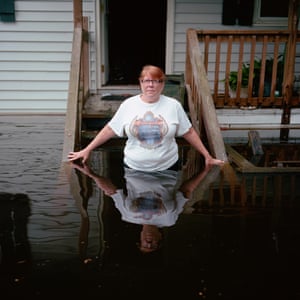 Kate Nesbitt, in Andrews, South Carolina, USA outside her flooded home