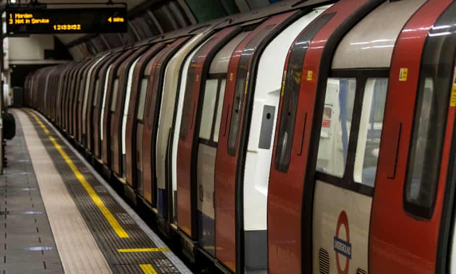 Tube train at a station in London