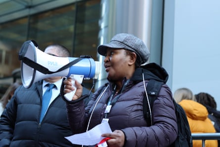 woman holds megaphone at demonstration