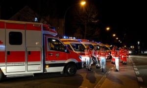 Ambulances and paramedics at the crime scene in Hanau near Frankfurt am Main.