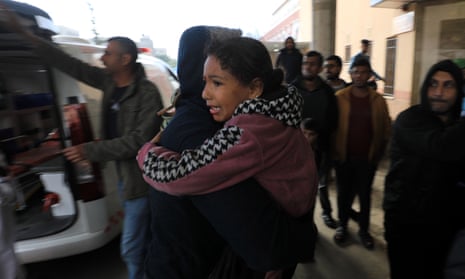 An injured girl is transferred to a hospital in Khan Younis, southern Gaza