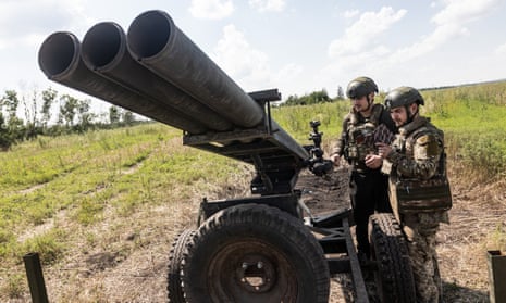 Ukrainian soldiers prepare to fire grad missiles in the direction of Bakhmut, Ukraine on 21 July.