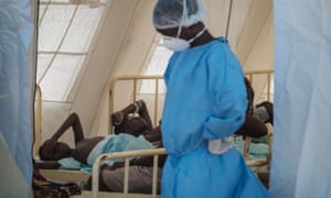 Patients who have diarrhoea are accommodated in a treatment tent at an urban health centre in Beira