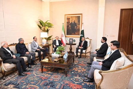 Iranian Foreign Minister Abbas Araqchi talks with Pakistan's Foreign Minister Mohammad Ishaq Dar and Army Chief, Field Marshal Asim Munir.