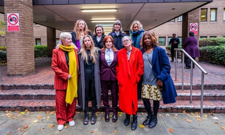 Gully Bujak (front row, second from left) and the eight other climate activists cleared of criminal damage on HSBC’s London headquarters in 2021, outside Southwark crown court, London, 16 November 2023.