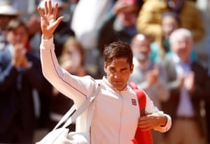 Roger Federer soaks up the crowd’s appreciation as he heads off court after his defeat.